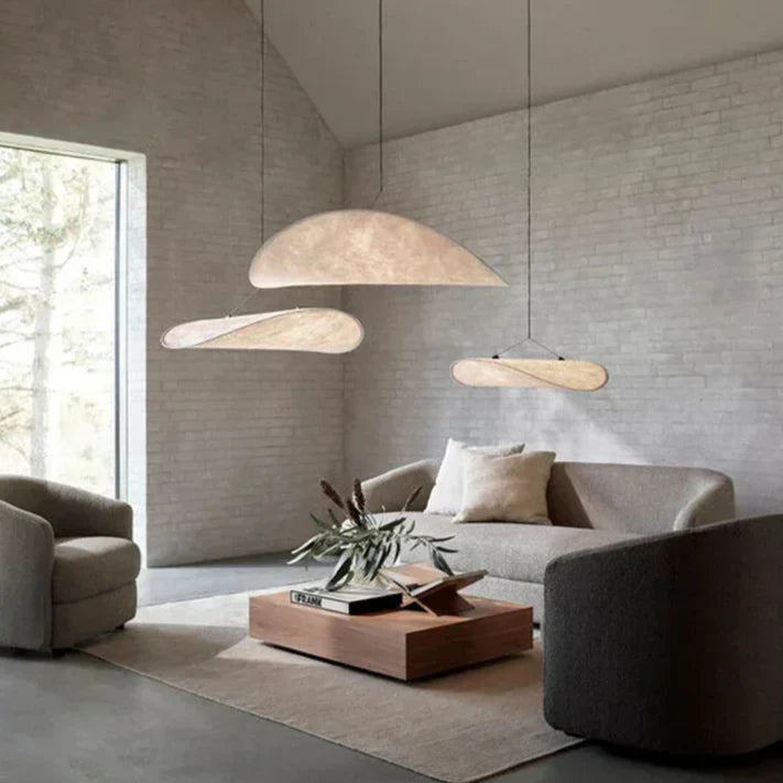 Sophisticated Japanese silk pendant light featuring unique wave design. Ideal elegant ceiling lamp for decor.
