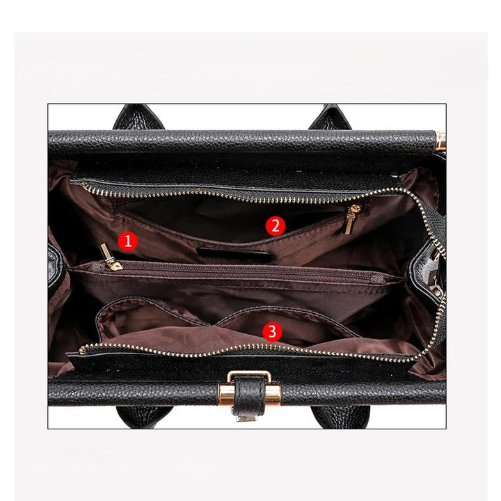 Sophisticated alligator embossed leather tote bag. Designer multi-compartment ladies' handbag for luxury fashion.