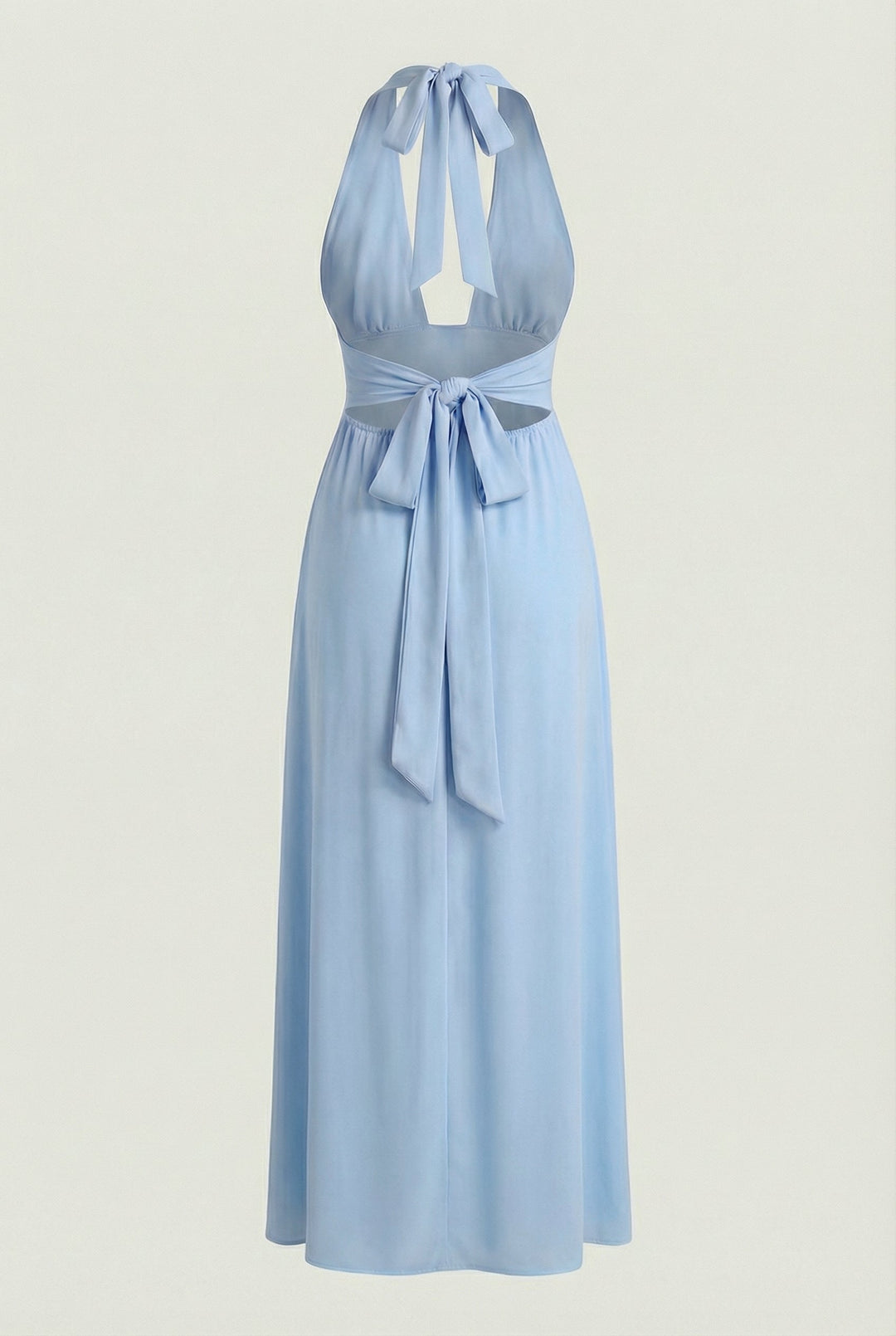 Stylish light blue evening gown. Halter neck, backless, high slit, and flowy fabric for chic party wear.
