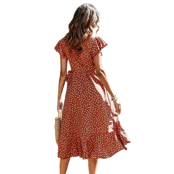 Comfortable brown polka dot wrap dress, short and flared, great for a casual summer day or elegant evening.