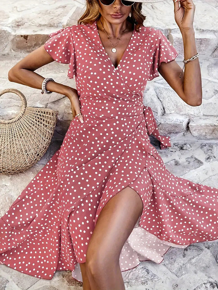 Light brown women's polka dot wrap dress with a flared skirt, an elegant choice for summer parties and events.