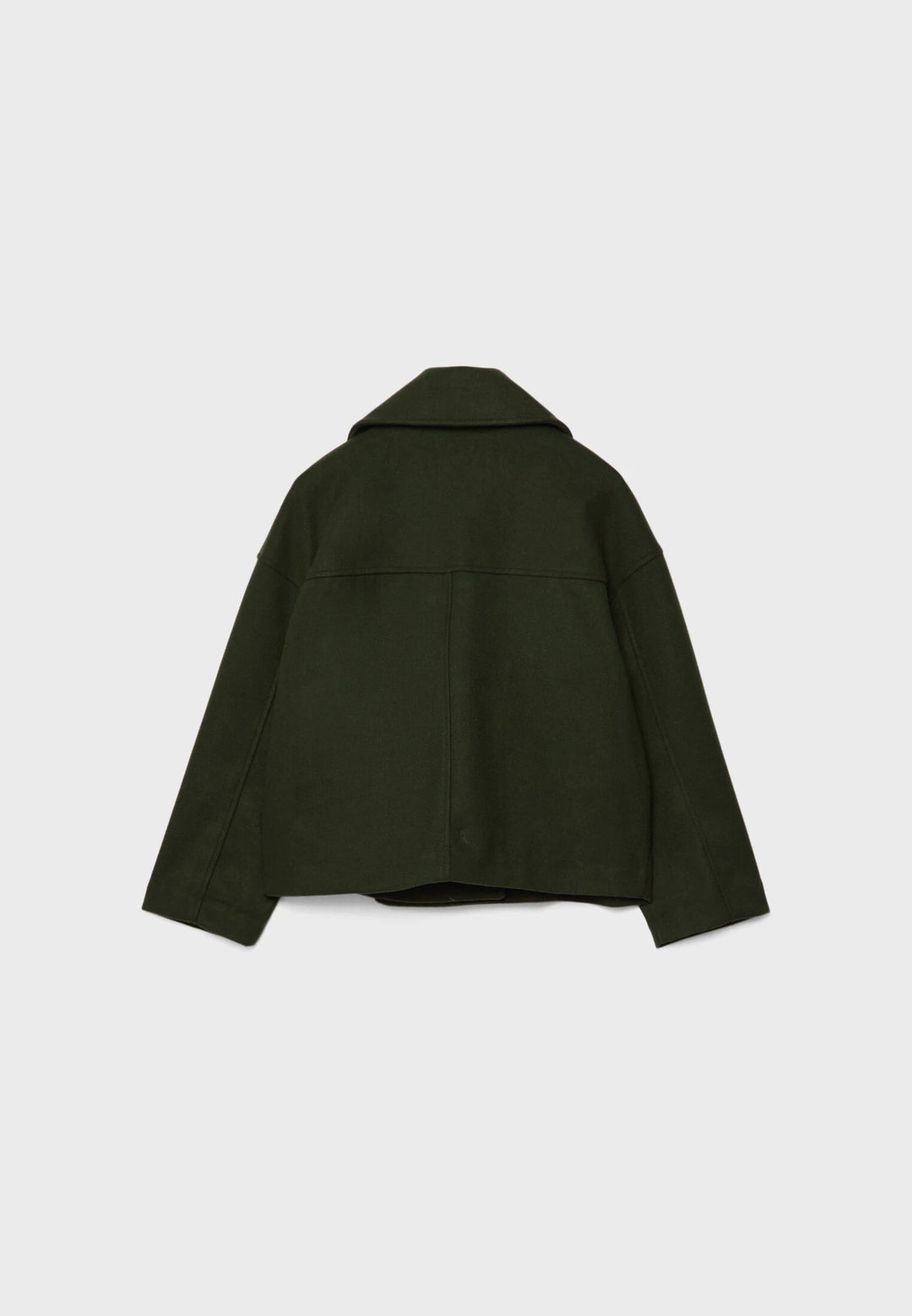Woman in elegant lightweight double-breasted summer jacket. Flowy outerwear for movement & style.