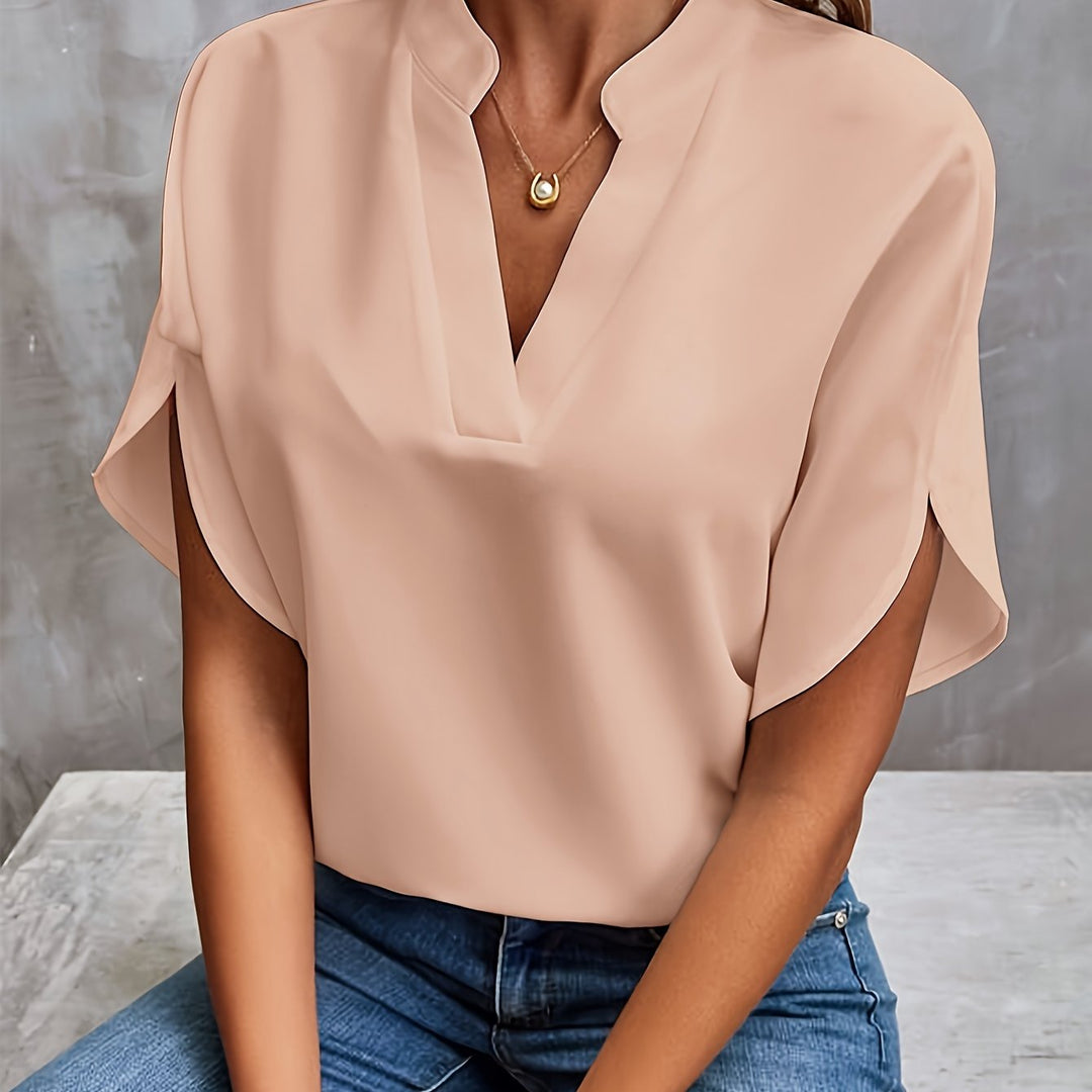 Women's elegant blouse, perfect for office wear or a chic summer outfit.