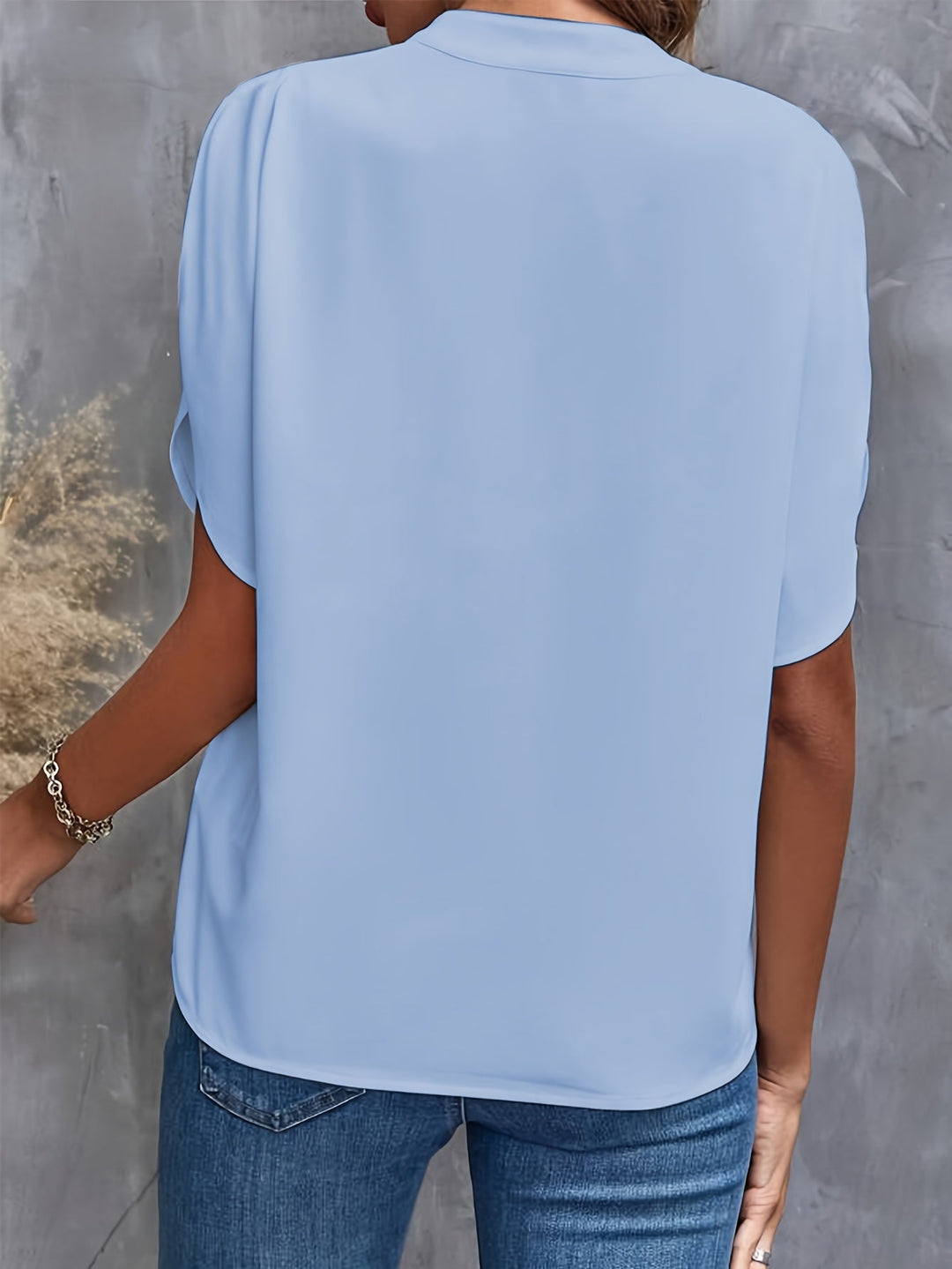 Elegant lightweight blouse for women, perfect for office or casual wear.