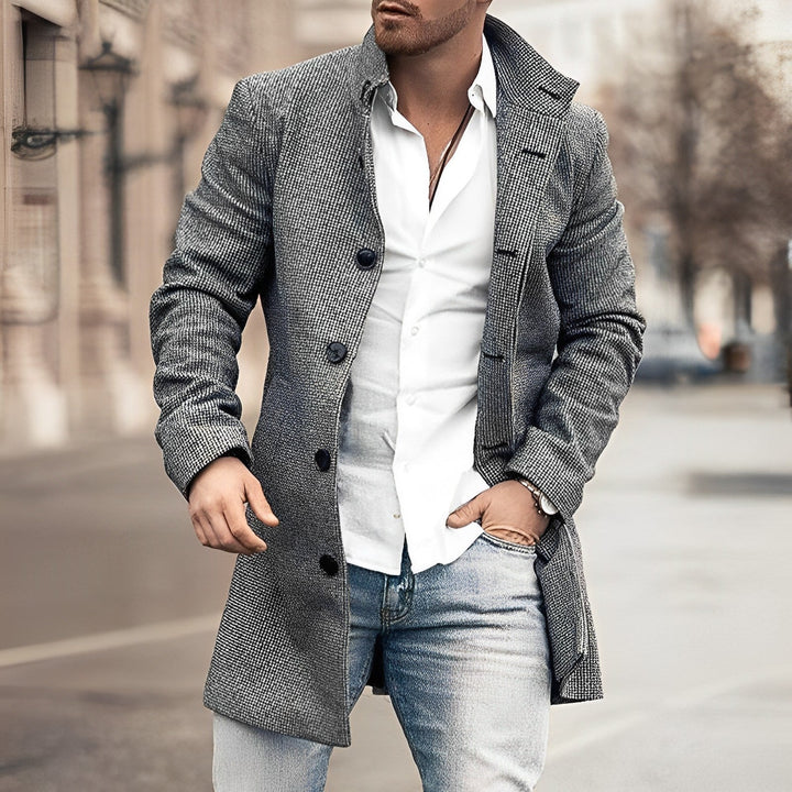 Elegant men's houndstooth checkered long coat, tailored for classic winter fashion and formal outerwear.