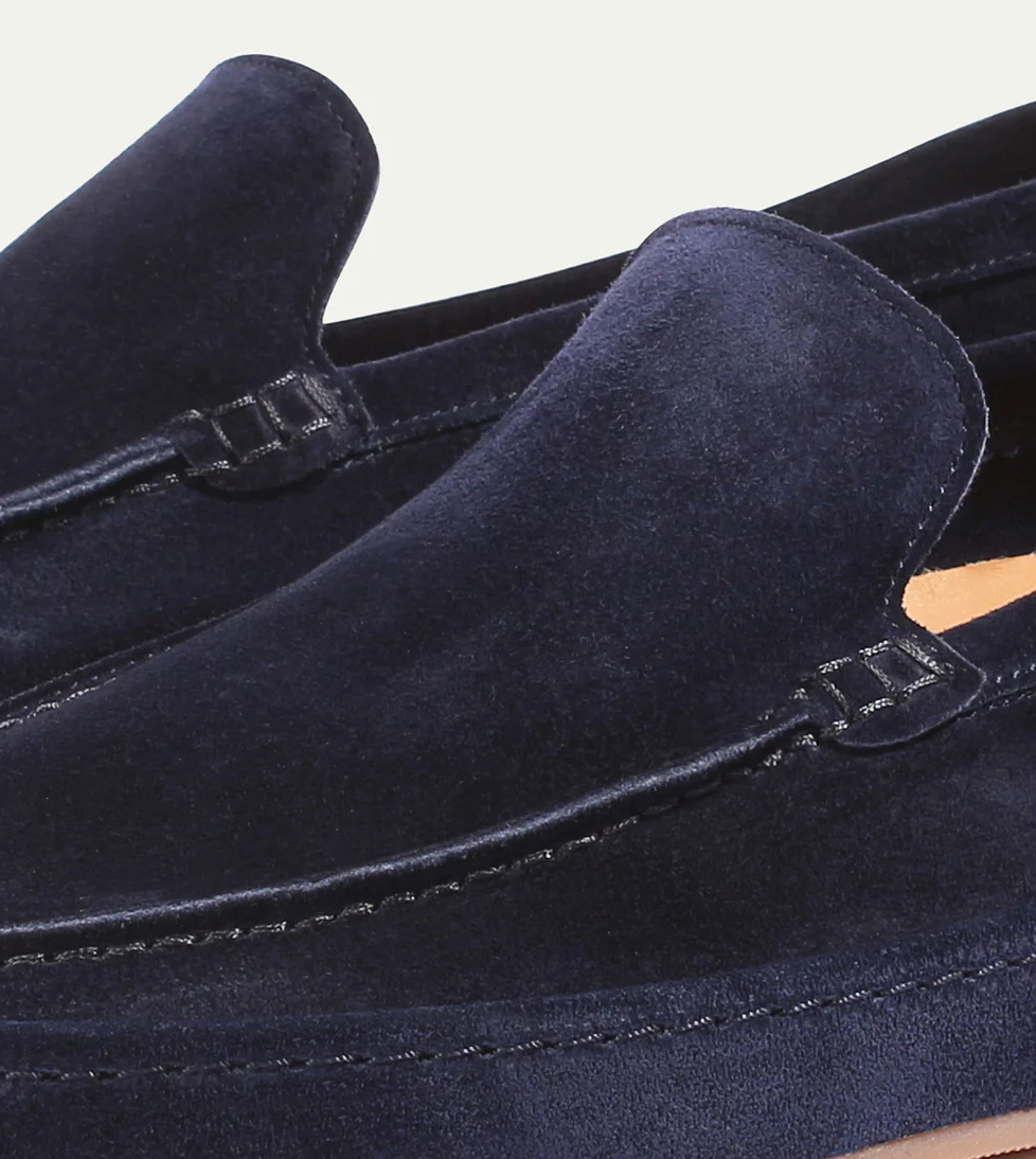Durable men's slip-on loafers, cushioned for long-lasting comfort in an elegant smart casual design.
