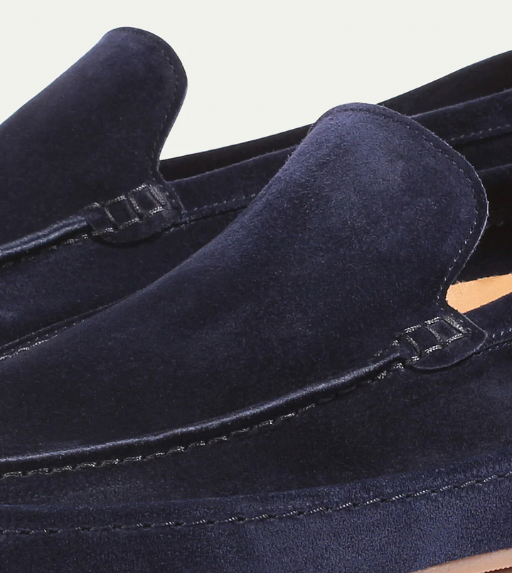 Durable men's slip-on loafers, cushioned for long-lasting comfort in an elegant smart casual design.