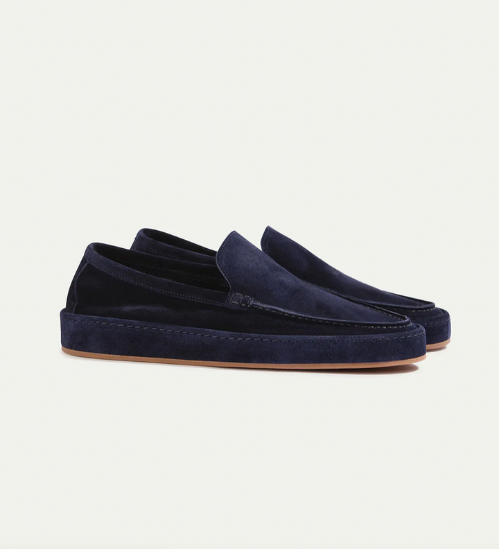 Men's smart casual slip-on loafers, offering elegant style & a cushioned fit for comfortable everyday wear.