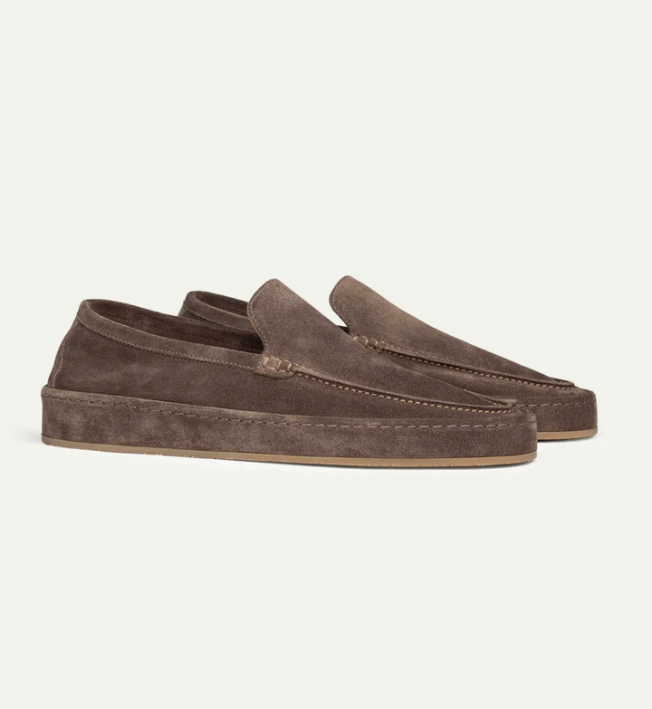 High-quality men's slip-on loafers, combining elegant design with cushioned support for smart casual outfits.