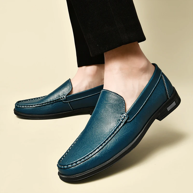 Elegant men's slip-on loafers, perfect for versatile formal or casual wear, blending style and comfort.