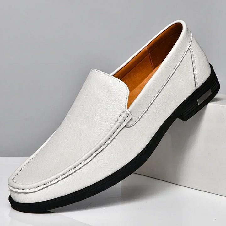 Stylish blue men's casual loafers, comfortable slip-on footwear for a modern, versatile fashion statement.