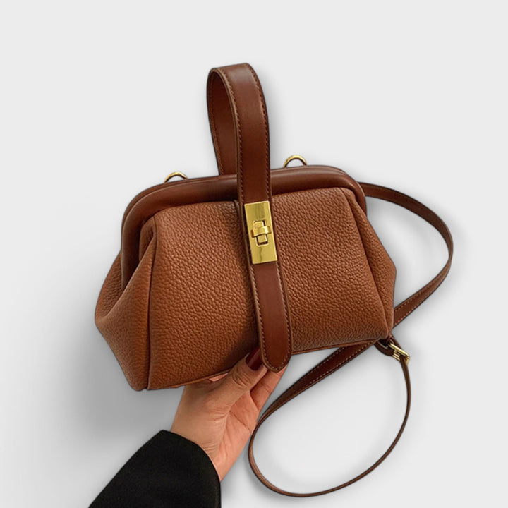 Elegant mini handbag for women, black PU leather, perfect as a shoulder or crossbody bag.