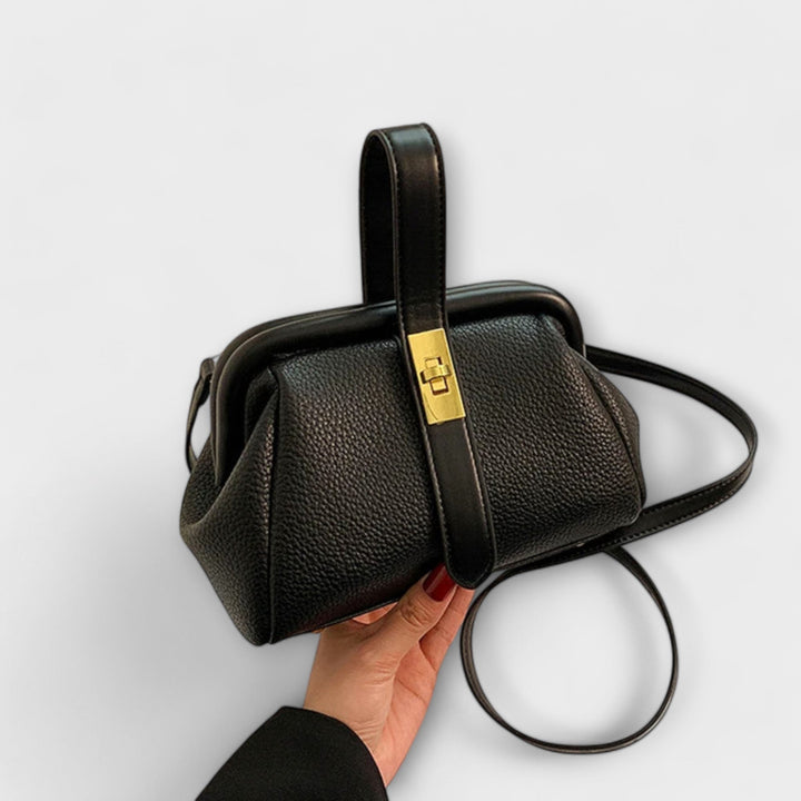 Modern women's elegant mini handbag, structured and stylish for any occasion.