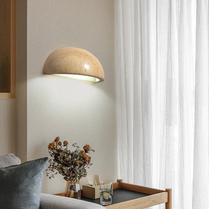 Modern decorative LED wall lamp crafted from natural stone, ideal for living room or bedroom accent lighting.