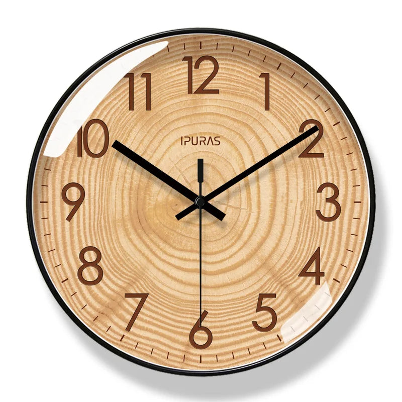 Modern wooden wall clock with quiet operation. Great for adding a stylish touch to any room's home or office decor.