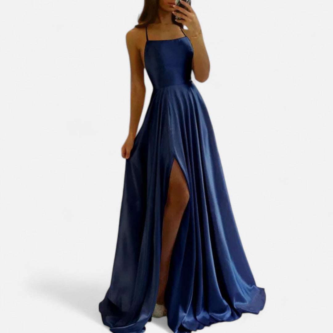 Stylish green formal maxi dress with a side slit, a beautiful option for a wedding or evening event