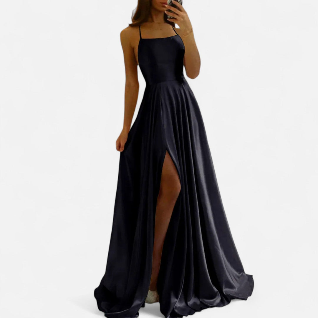 Close-up of a high-quality fabric on an elegant slit maxi dress, suitable for wedding guests