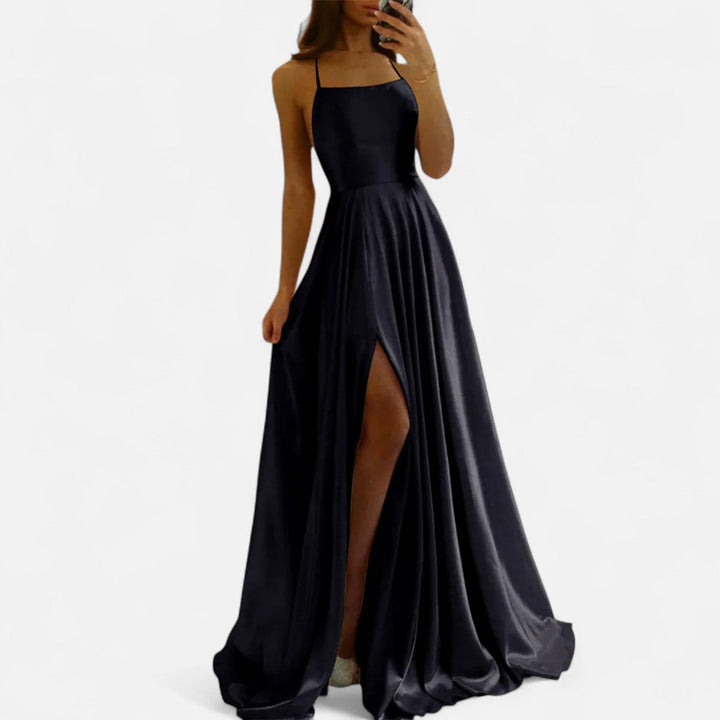 Close-up of a high-quality fabric on an elegant slit maxi dress, suitable for wedding guests