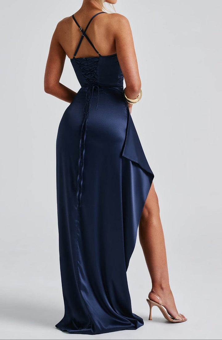 Women's formal navy blue sleeveless maxi dress with a stylish high slit, front view.