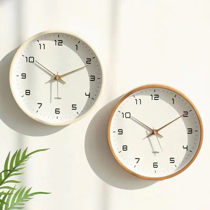 Elegant Nordic wooden wall clock, minimalist design for modern home decor. Silent quartz movement in cream and brown.