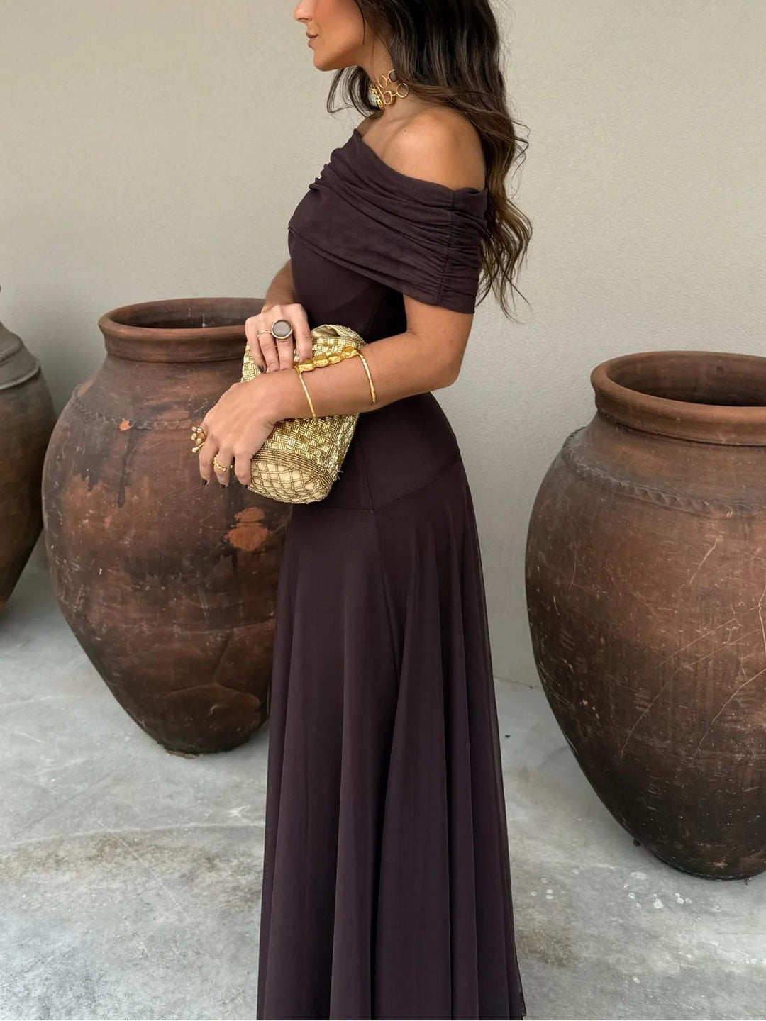Chic brown off-shoulder maxi dress, perfect for elegant evening parties & special occasions.