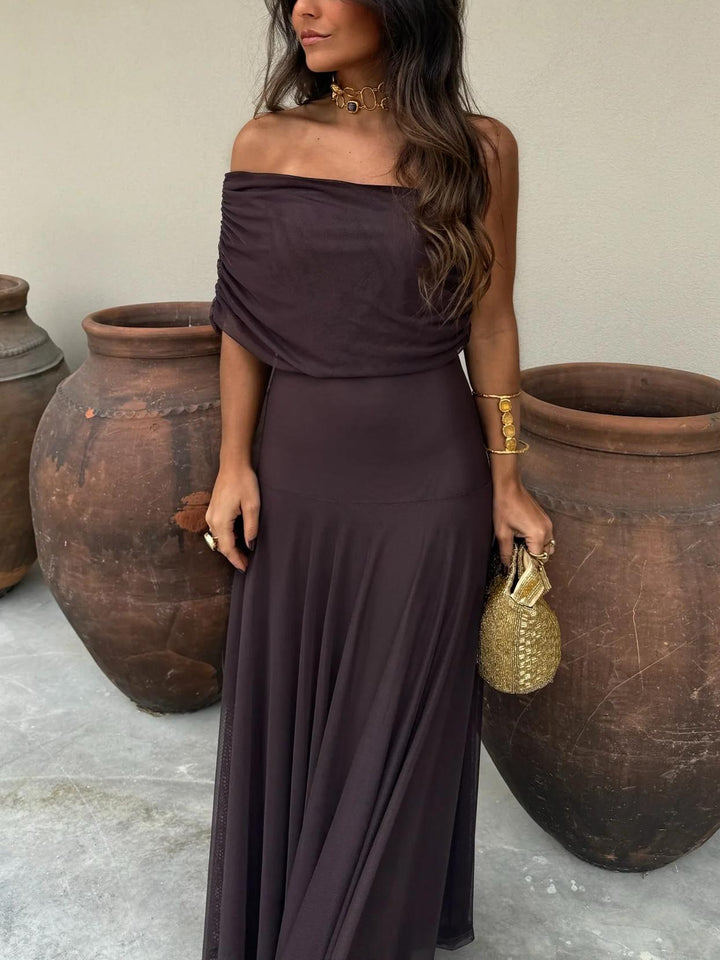 Off-shoulder flowing maxi dress, a stylish & comfortable option for evening garden party wear.