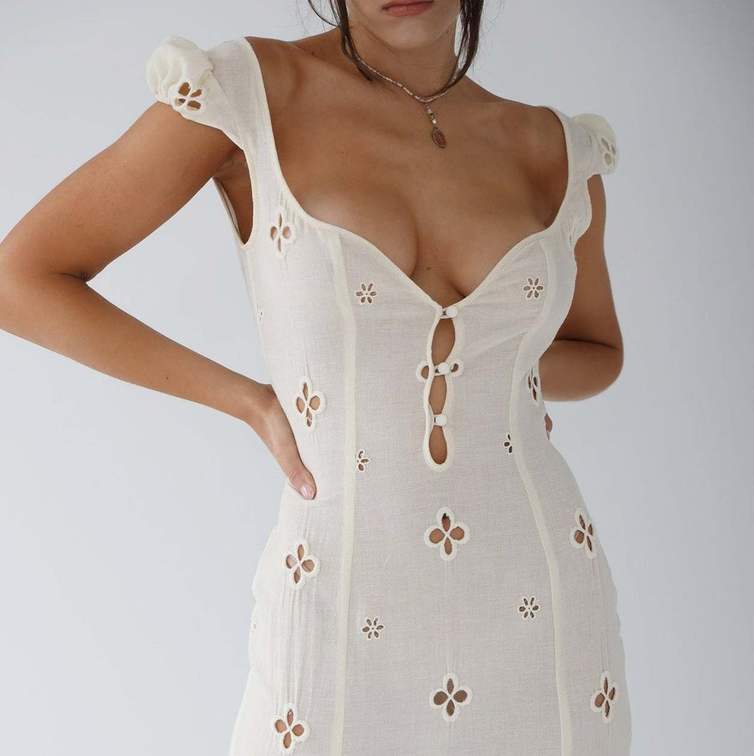 Elegant off-white mermaid wedding guest dress, floor-length with delicate lace detailing, perfect for formal occasions.