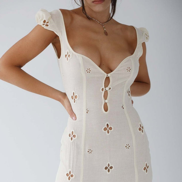 Elegant off-white mermaid wedding guest dress, floor-length with delicate lace detailing, perfect for formal occasions.