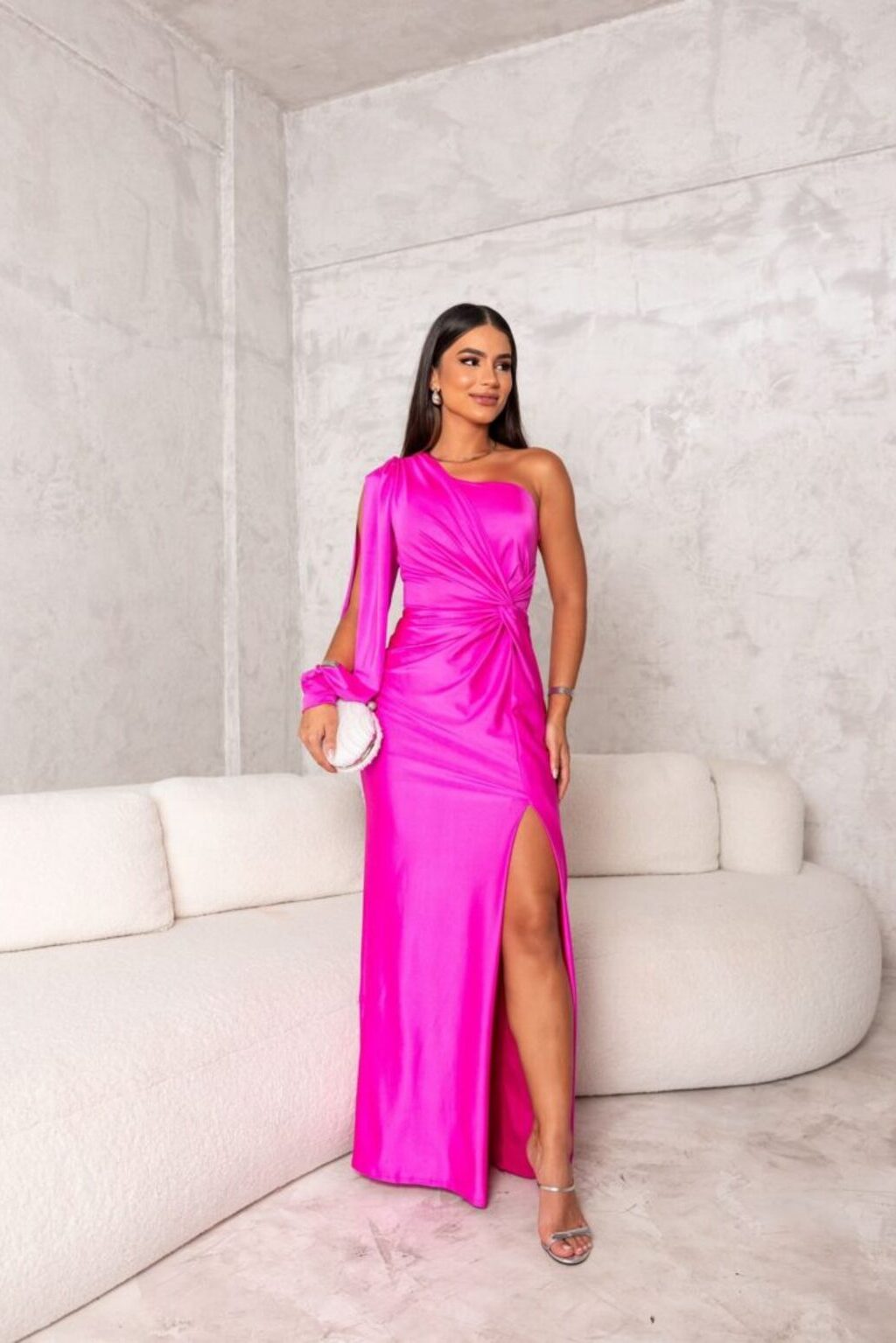 Chic one-shoulder evening gown in a rich color, ideal for parties and formal events.