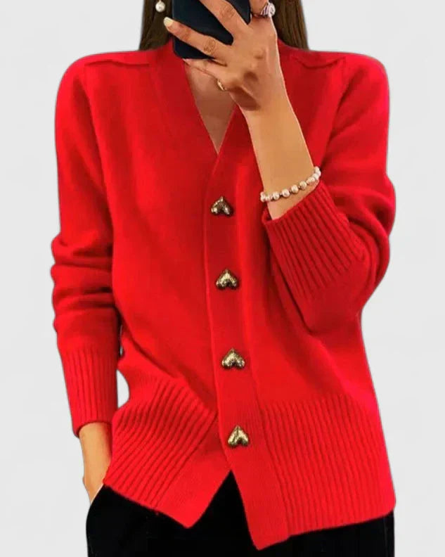 Full shot of a model wearing a sophisticated women's elegant open front cardigan sweater.