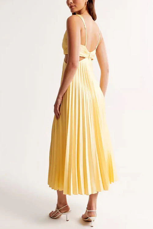 Close-up of a women's pleated maxi dress fabric texture, showcasing elegant flowy summer gown detail