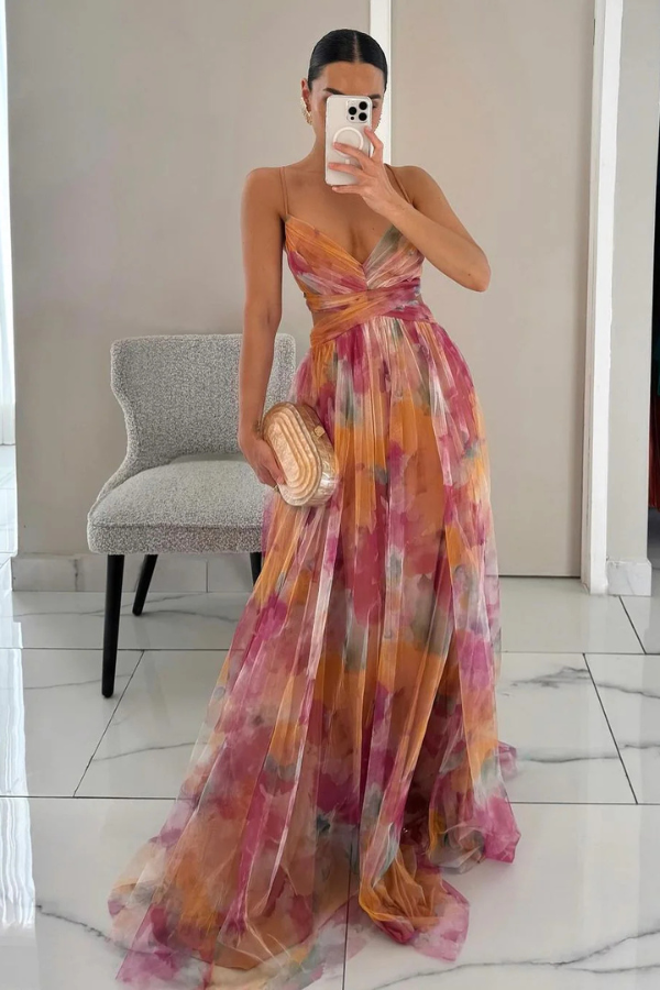 Elegant pleated maxi dress in a flowy summer style, perfect for women's occasion wear.