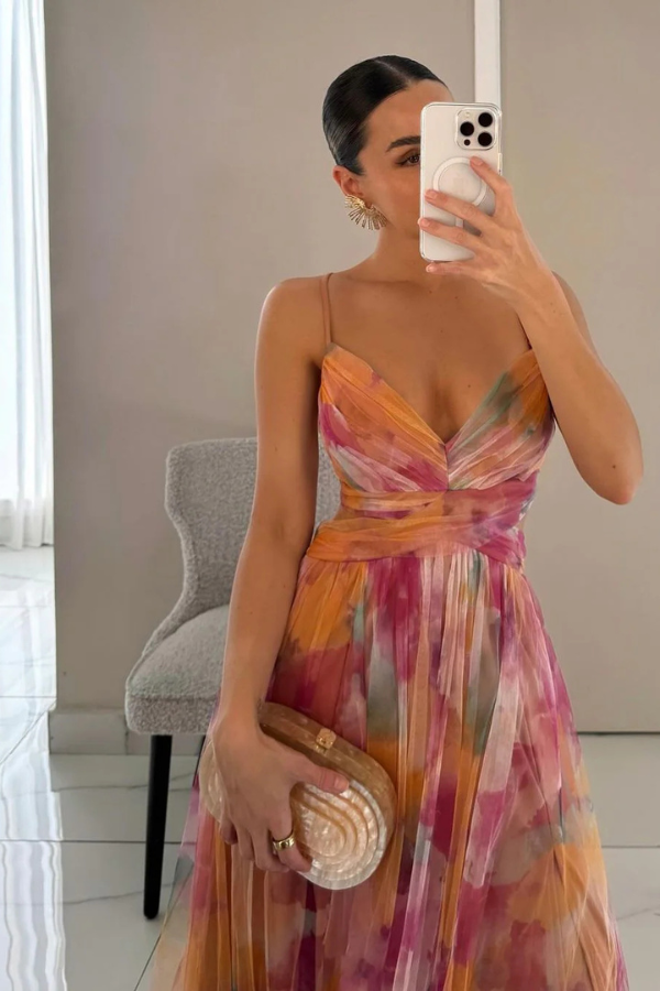 Flowy summer maxi dress with delicate pleats, an elegant choice for women's fashion.