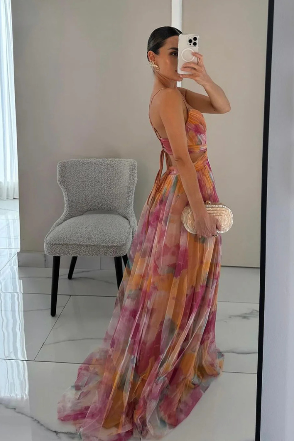 Elegant women's pleated maxi dress, showcasing a beautiful flowy summer style.