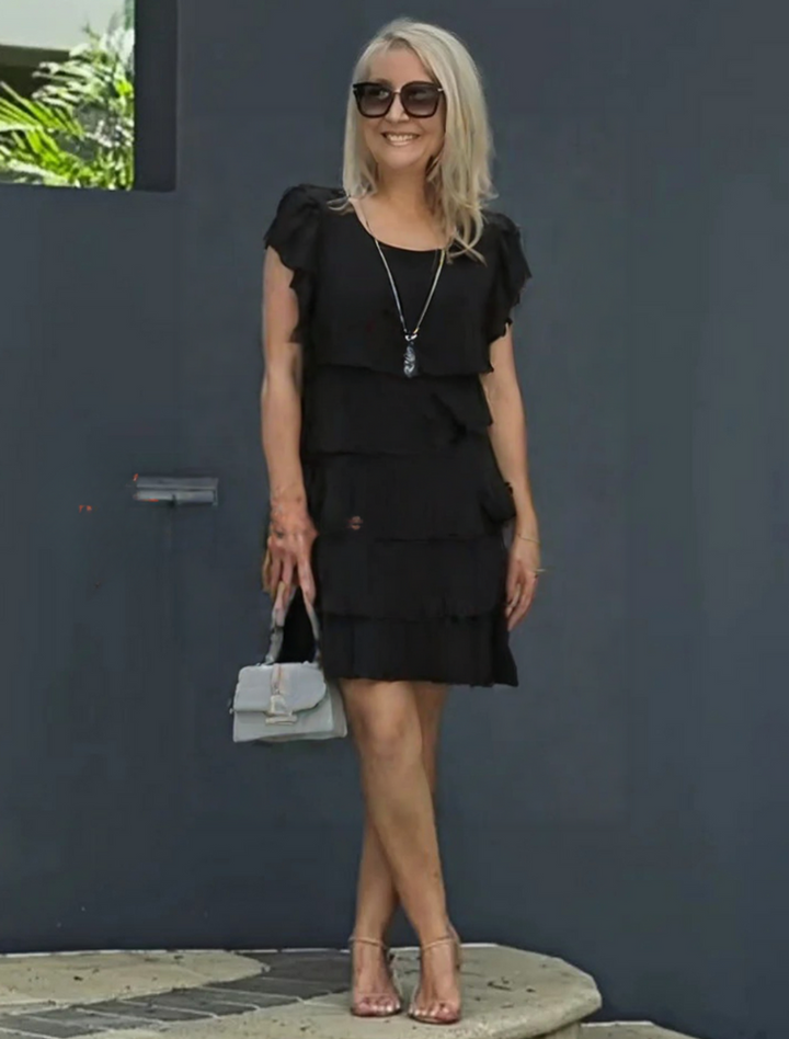 Red layered midi dress with short sleeves, combining comfort with elegant style for women.