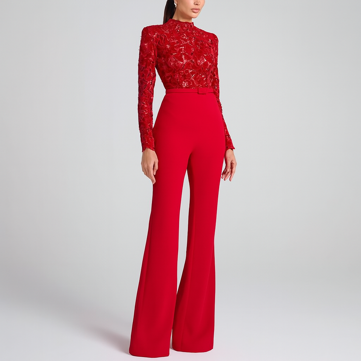 Stylish women's red jumpsuit featuring a delicate lace embroidered top, cinched waist, and wide leg for evening.
