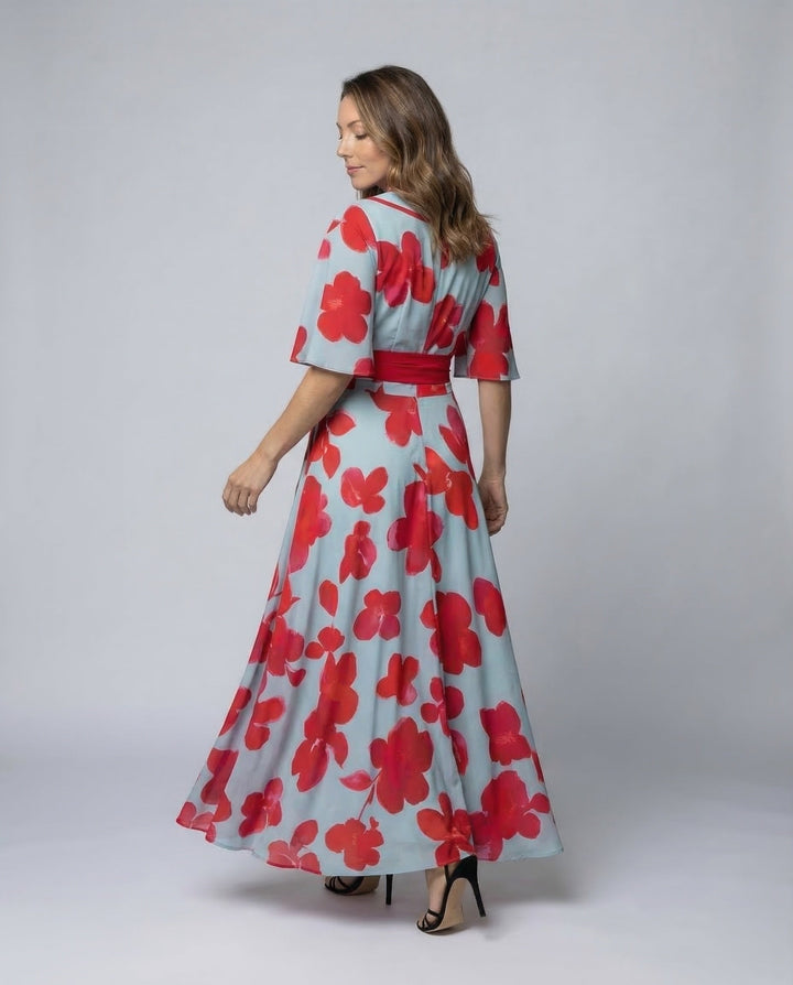 Fashionable red elegant women's dress with a V-neck, flowing silhouette, suitable for evening events.