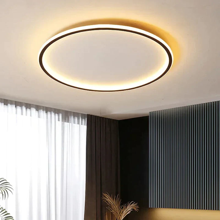 Dimmable round LED ceiling light, white finish, perfect for contemporary interior lighting.