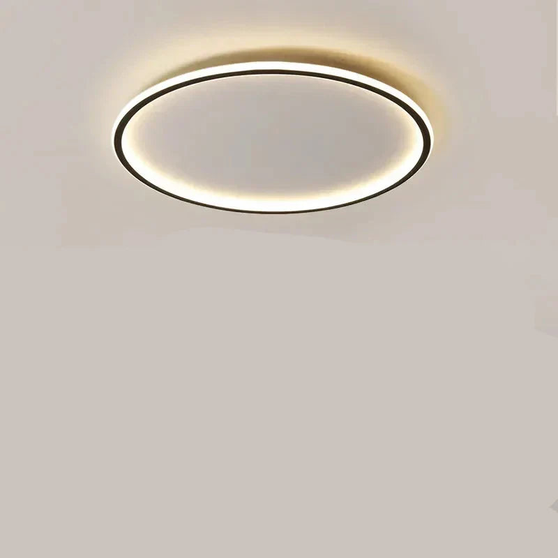 Elegant gold round LED ceiling light, dimmable, perfect for creating various ambiances.