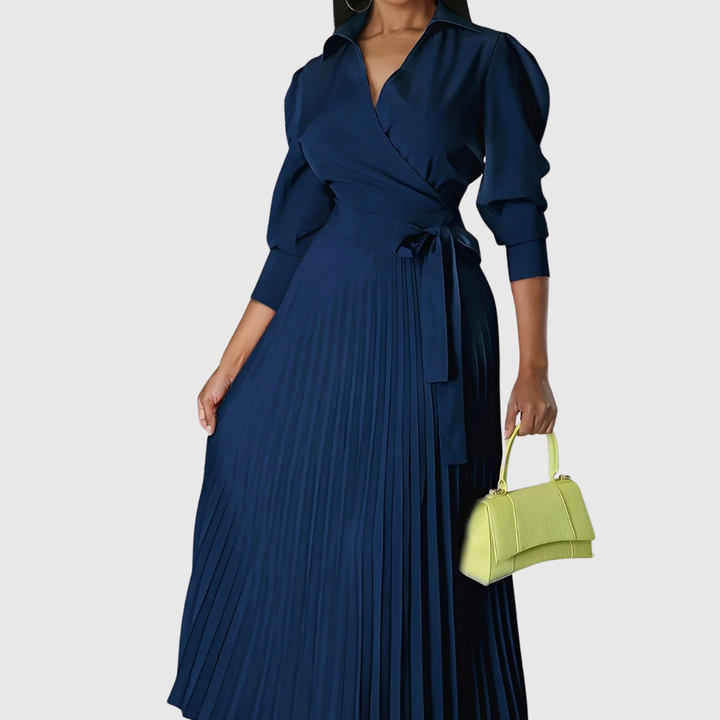 Sophisticated pleated midi dress in a soft fabric, ideal for women's fashion.