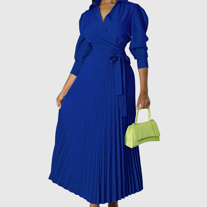 Beautiful women's elegant midi dress featuring graceful soft pleats.