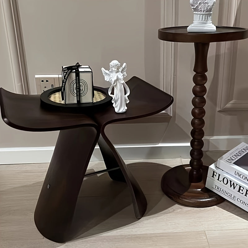 Elegant Butterfly Stool made of solid wood. Versatile, stylish home decor furniture for any entrance or room.