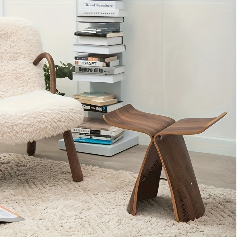 Elegant solid wood Butterfly Stool, a classic and versatile furniture piece for contemporary home decor.