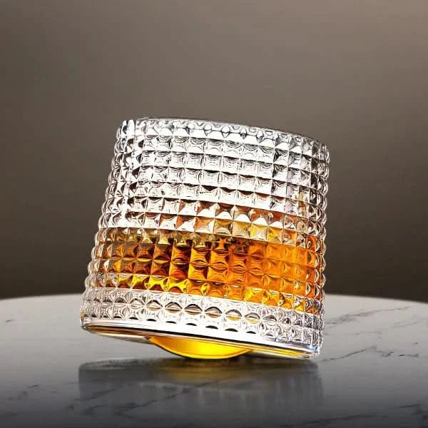 Elegant spinning whiskey glass, a unique Japanese Edo design tumbler for bourbon and spirits, enhancing barware enjoyment.