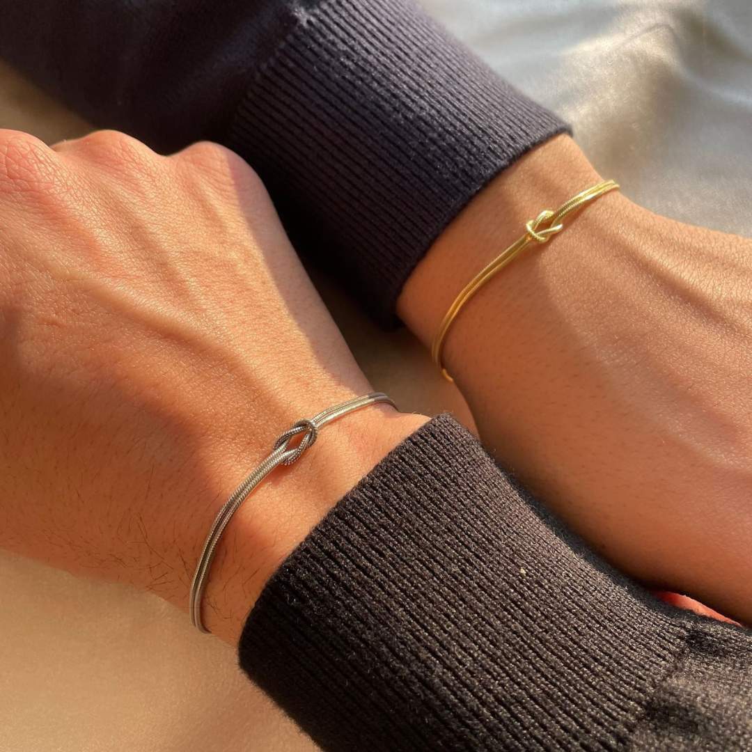 Elegant stainless steel knot bracelet for women, a subtle and stylish minimalist accessory.