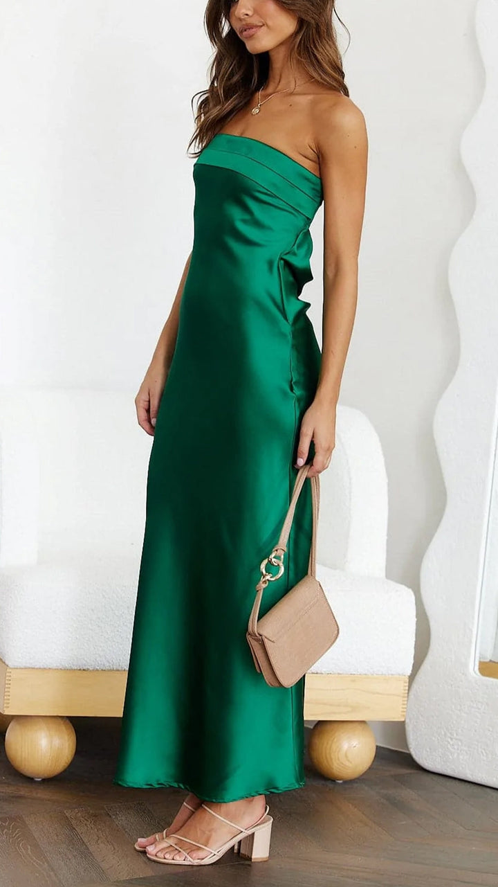 Detailed shot of the straight neckline on an elegant satin maxi dress for women, emphasizing quality and design.
