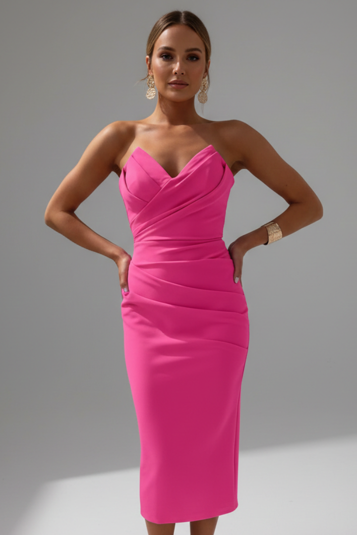 A model showcasing a women's strapless ruched midi cocktail dress, ideal for special occasions.