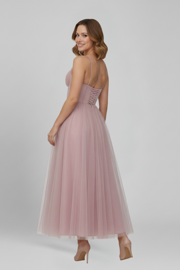White strapless tulle maxi dress, a stylish and comfortable choice for summer formal events.