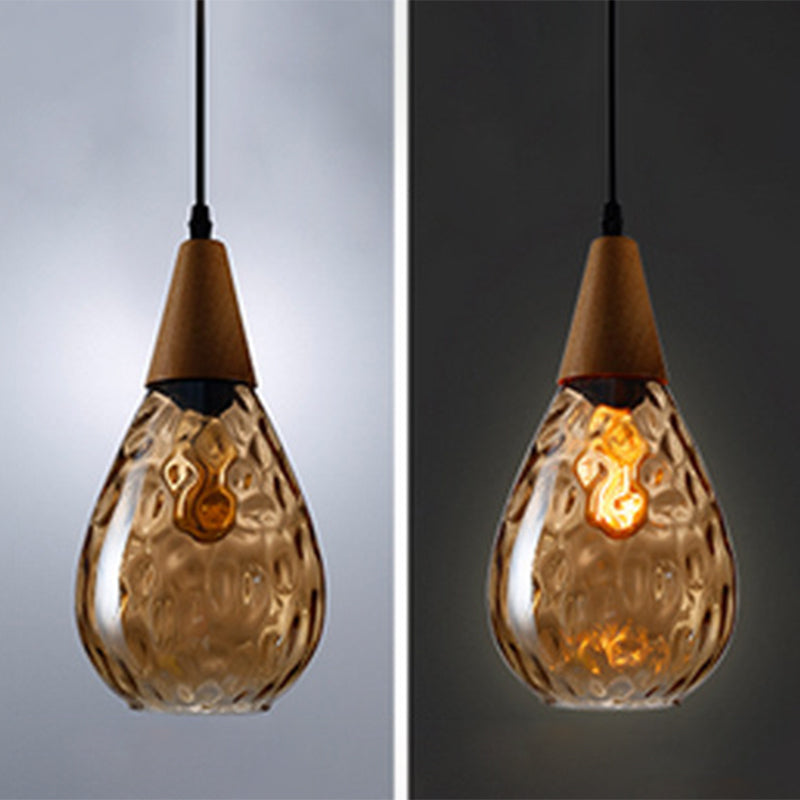 Clear glass teardrop hanging light, contemporary ceiling fixture.