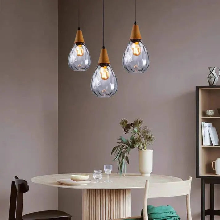 Beautiful teardrop glass pendant, provides ambient modern light.